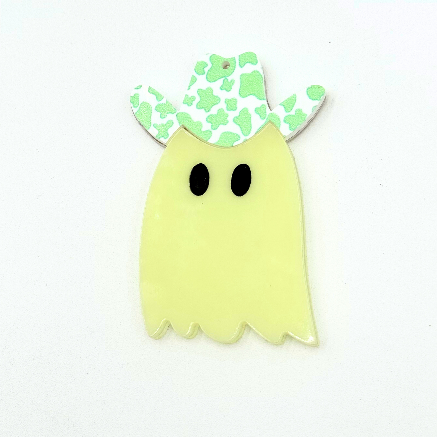 Green cow print hat on western ghost basket tag
