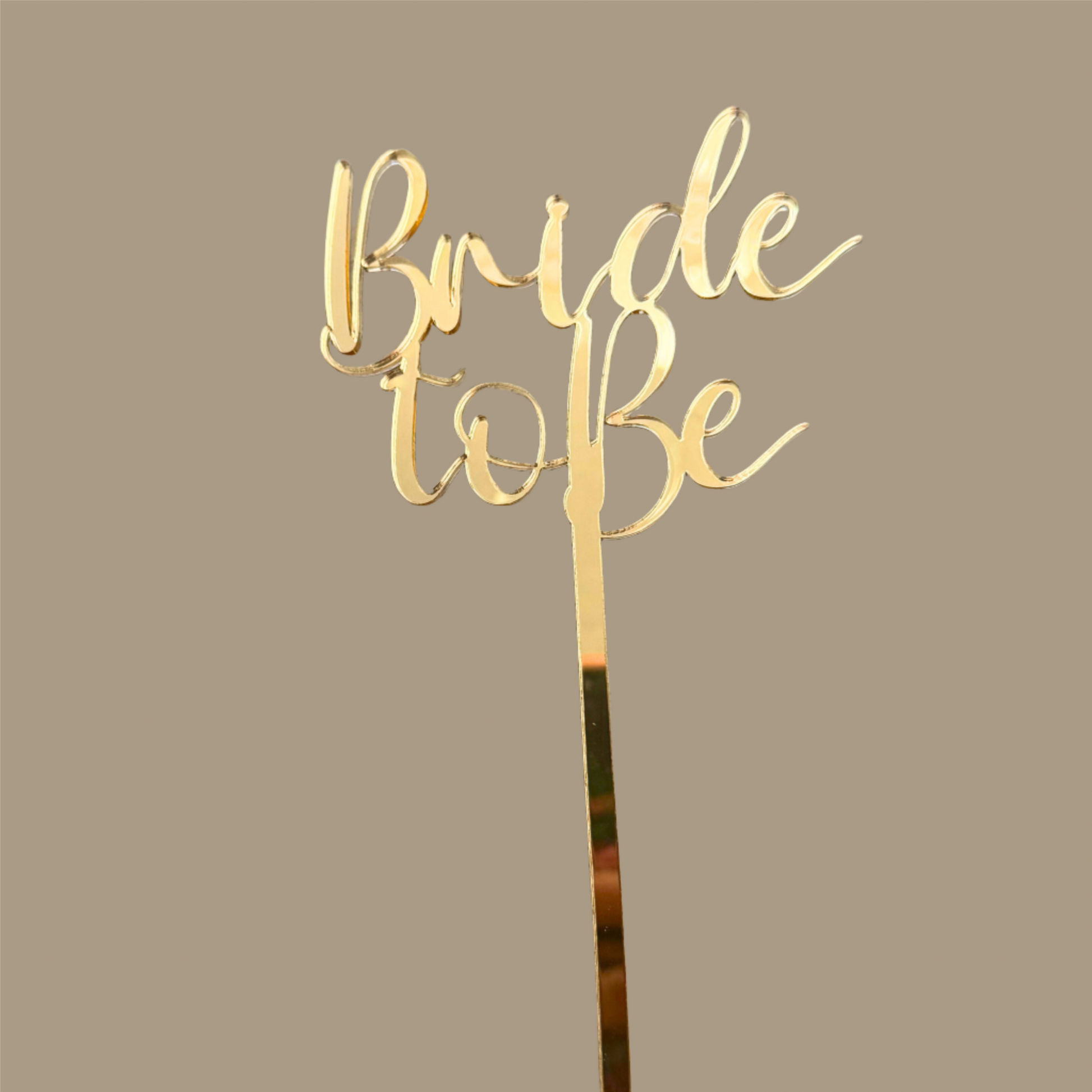 Bride to be cake topper in gold