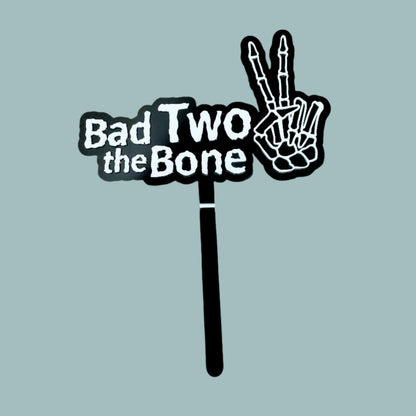 Bad two the bone cake topper in black and white