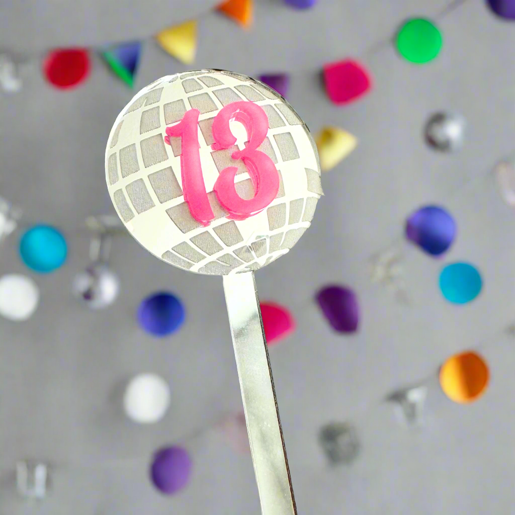 Silver disco ball cake topper