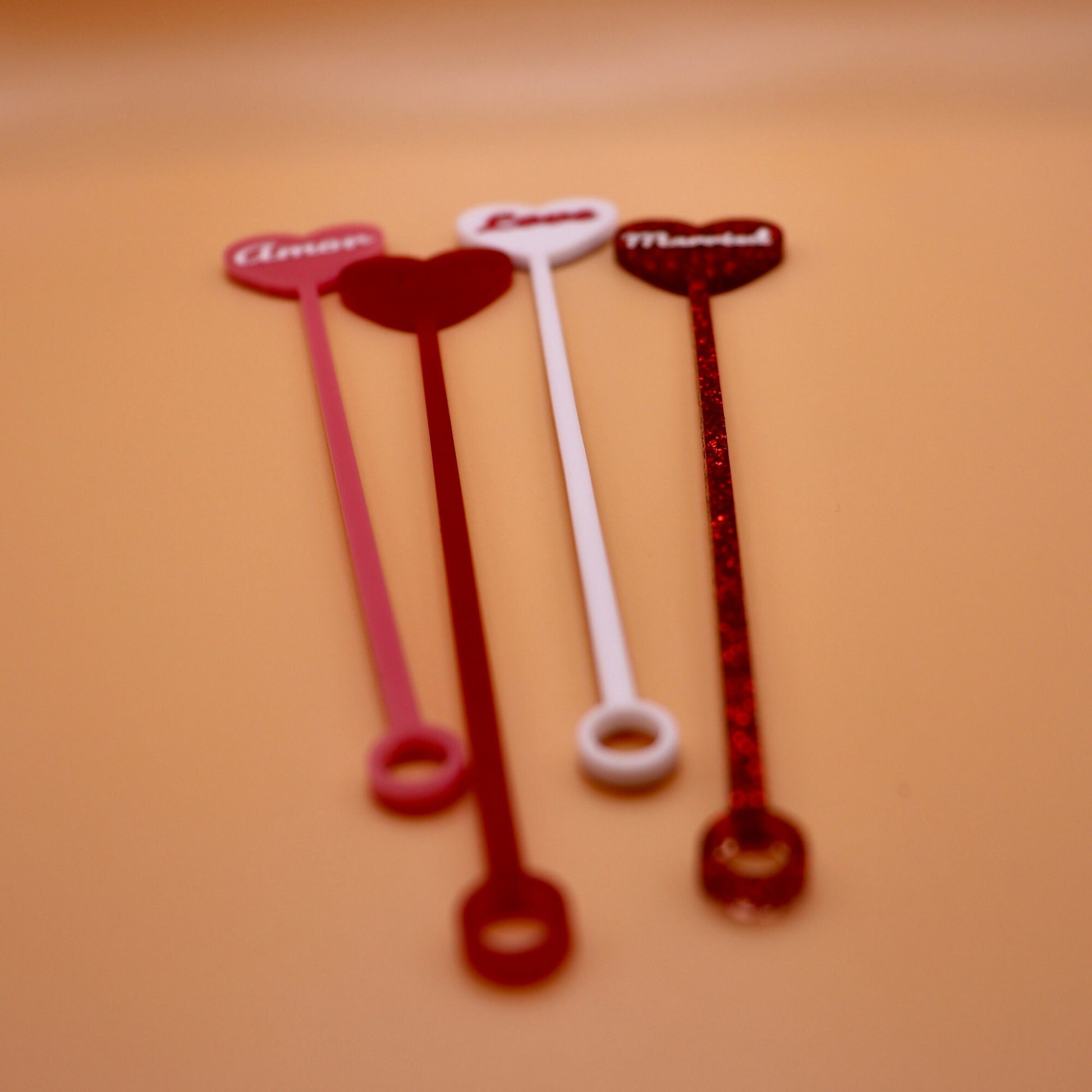 Details of bottom of stirrers are cut out circles to effectively stir drinks