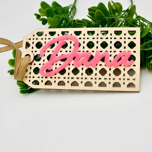 Rattan tag with pink text