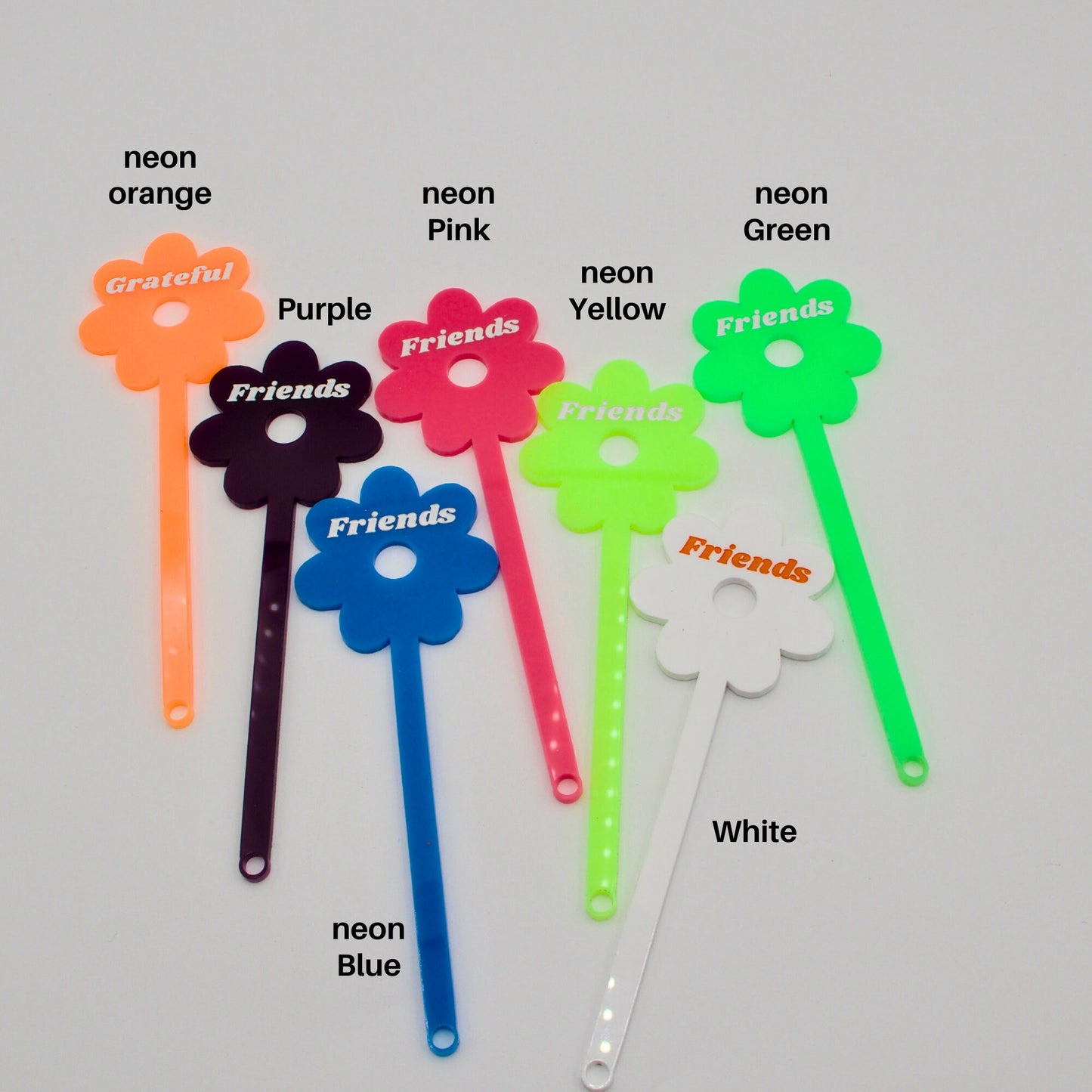 Assortment of drink stirrers lying flat for color comparison