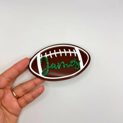 angled image of football bogg tag