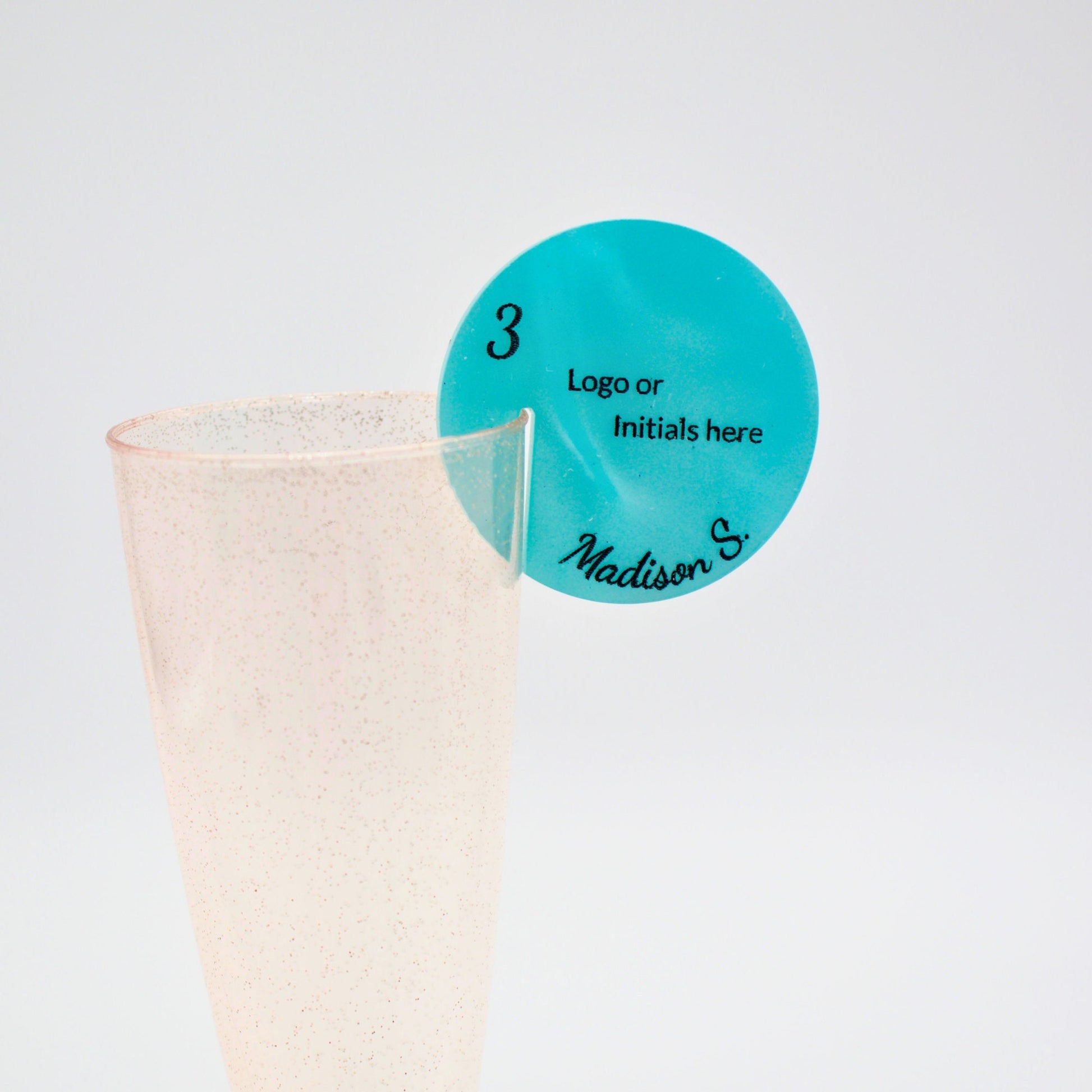 Close up of aqua pearl drink tag