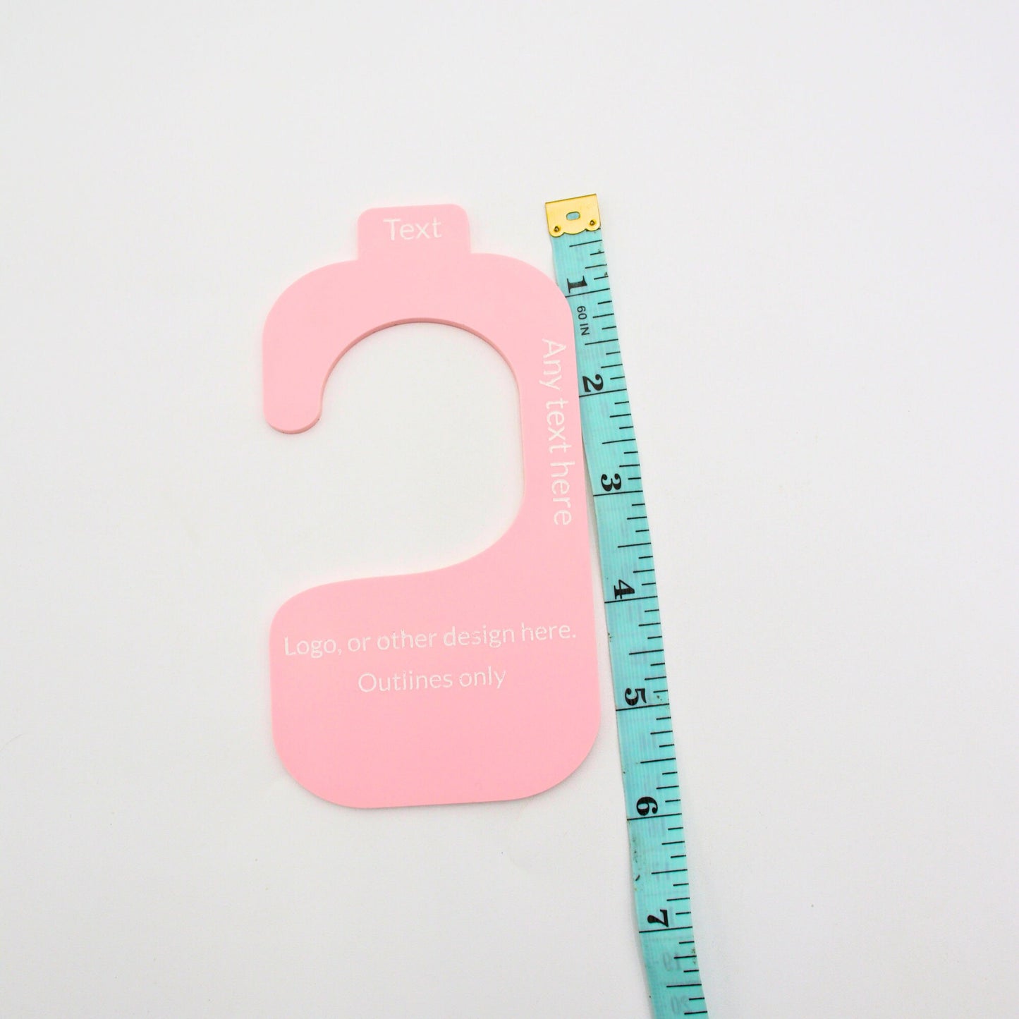 Hanging divider in pink with measuring tape to show length